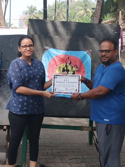 A graduate from our November basic batch receiving her certificate. We run batches year-round, so there's always an opportunity to start.