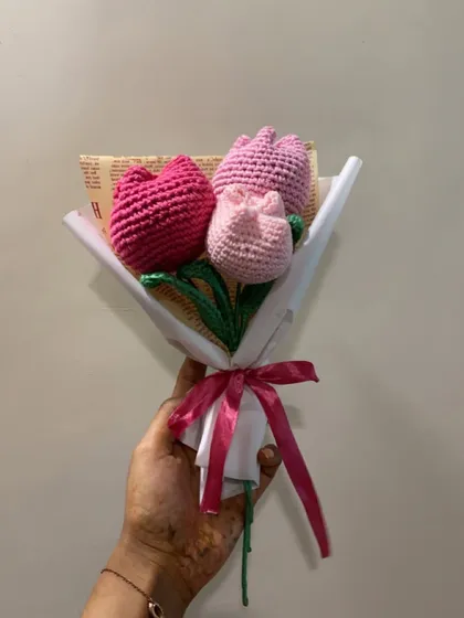Three shades of pink in one sweet bouquet. This arrangement of crochet tulips in light, medium, and dark pink is simple, elegant, and so pretty.