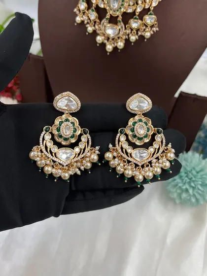 The 'Darbaar' earrings in green.