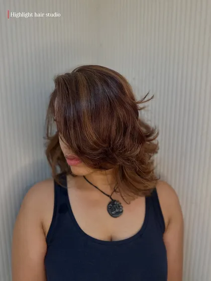 This shot shows the beautiful feathered layers that frame her face.