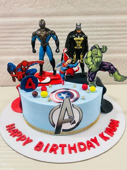 Another awesome Avengers assembly on a cake, featuring Batman, Superman, and Hulk for a truly super birthday.