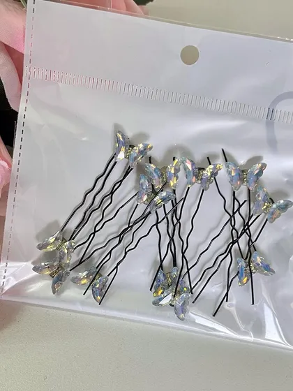 These mini butterfly U-pins are delicate, classy, and add just the right amount of sparkle to your hairstyle.