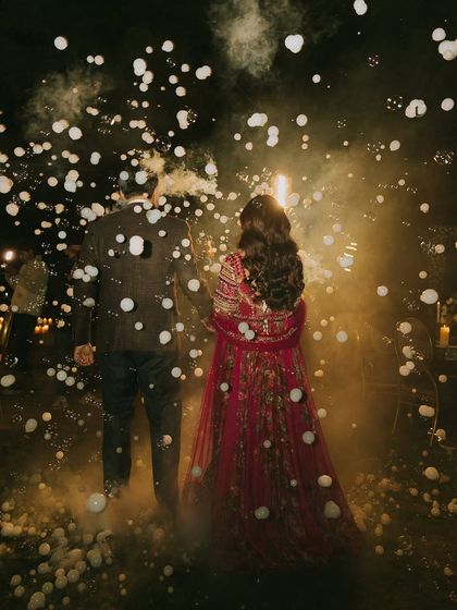 A magical exit through a cloud of bubbles. This photo shows that a great makeup and hair look will hold up through all the fun and memorable moments of the night.
