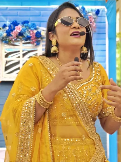 In action during a Haldi carnival at Ocean Pearl Retreat. With a mic in hand and fun games planned, I'm ready to turn any function into an unforgettable party.