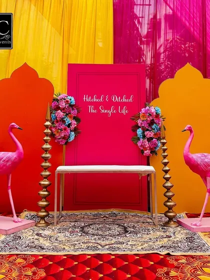 Let's add a touch of fun to your Mehndi. This quirky photo booth with its bright flamingo props and a playful "Hitched & Ditched The Single Life" sign was a huge hit and created so many fun memories for the guests.