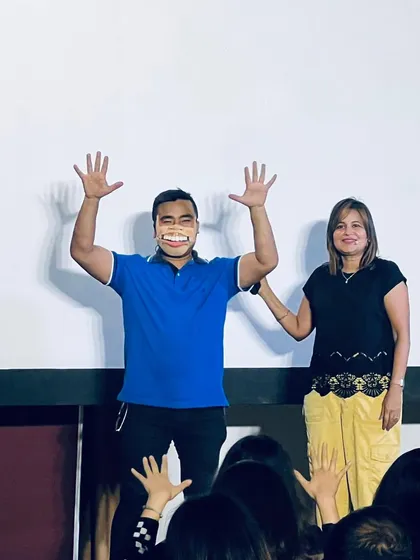 The big finish of a human puppet segment. The volunteer is always a great sport, and the audience loves seeing one of their own become part of the show.
