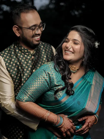 A sweet photo of the couple, both glowing with happiness.