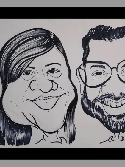 Simple, bold, and full of personality. This black and white ink caricature of a couple highlights their features and smiles without the distraction of color, creating a powerful and classic look.