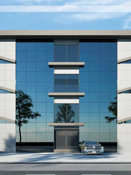 A proposed elevation for a factory in Bahadurgarh, showcasing our expertise in industrial and commercial architecture. The design uses a clean combination of glass and ACP panels to create a professional and modern industrial facade.