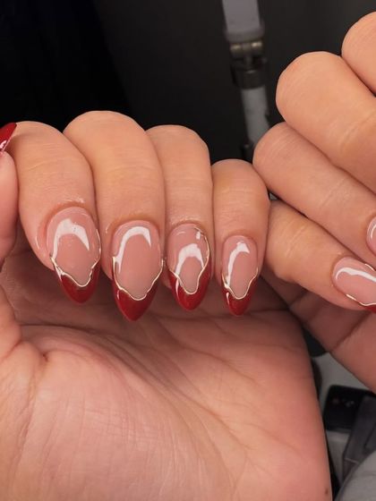 Another great winter option with these abstract red French tips.