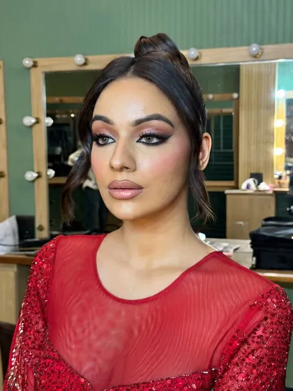A final look at this unfiltered red-dress glam, perfect for a cocktail or sangeet night.