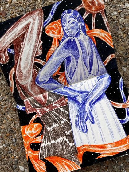 A sketchbook drawing with contrasting blue and brown figures.