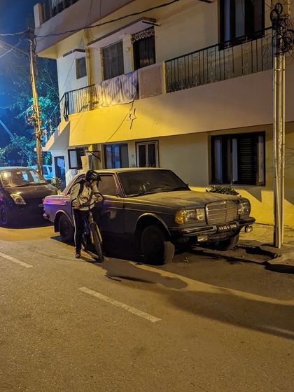 A classic Mercedes we found parked on a quiet street in Indiranagar during our Christmas ride. You never know what automotive gems you'll find when exploring the city at night.