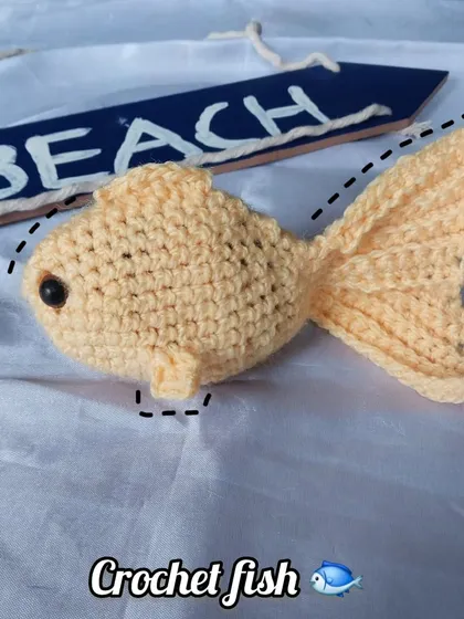 Another angle of the crochet fish, showing its cute tail.