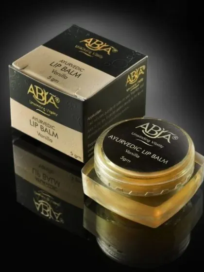 My Ayurvedic Lip Balm in Vanilla, crafted from pure beeswax and Shatadhut ghrut to heal cracks and improve lip tone.
