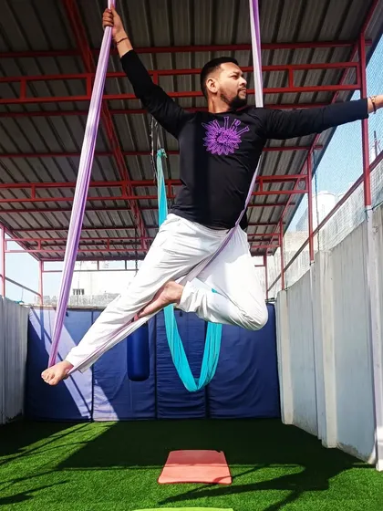 Feel the power and grace of floating in the air. This pose is a great way to build upper body strength and feel completely weightless. It's a dance between strength and surrender.