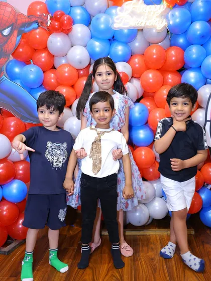 The birthday squad assembles for a group photo. It's wonderful to see friends celebrating together and making memories at our play zone.
