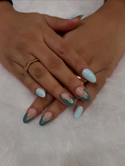 A chic and modern color-block design. This set combines a solid mint green with a sheer base and an abstract shape in a darker teal, outlined in gold.