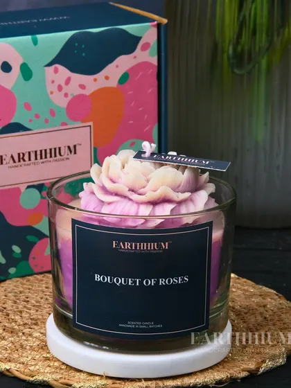 My 'Bouquet of Roses' candle in a classic glass jar, featuring a beautifully sculpted peony on top.