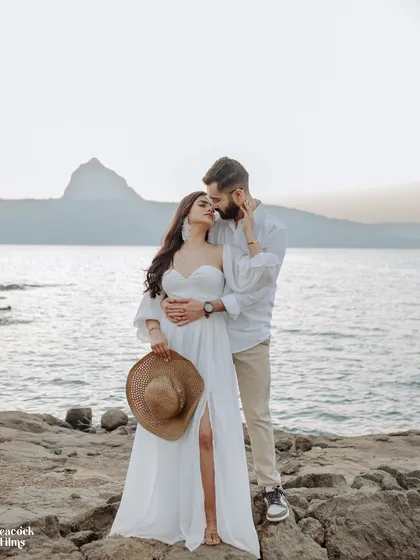 By the serene lakeside at sunset, a quiet promise is shared. This intimate pre-wedding portrait captures the gentle, unspoken bond that forms the foundation of a lifetime together.