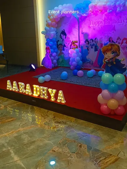 A different perspective of the princess-themed stage decor.