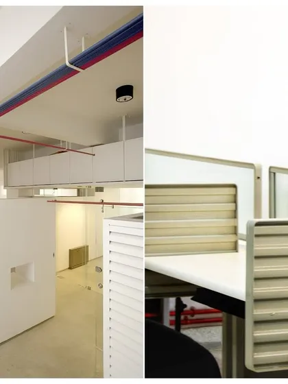 A couple of details from the Ananya Technologies office. You can see the color-coded pipes on the ceiling and the clean, functional design of the workstation partitions.
