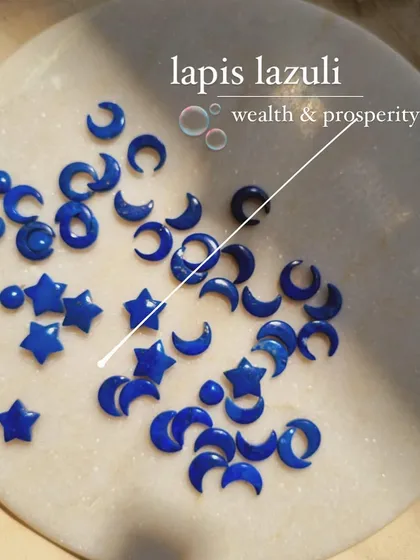 A closer look at my raw lapis lazuli stones, which I carve into stars and moons. This stone is believed to attract money and prosperity.