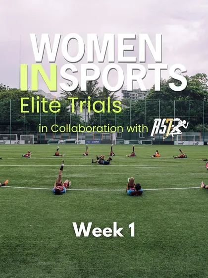 A wide shot of the Women in Sports Elite Trials, showing athletes during an on-field warm-up. This image captures the scale and professionalism of the high-performance camp.