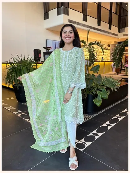 This fresh green kurta set is perfect for adding a pop of color to your wardrobe. The light fabric and breezy dupatta make it ideal for warmer weather.