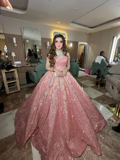 This client looks like a princess in her magnificent pink ballgown. The makeup is equally dreamy and glamorous.