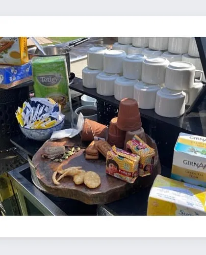 A closer look at our tea station, with various tea bags, sugar options, and traditional clay kullads for an authentic chai experience.