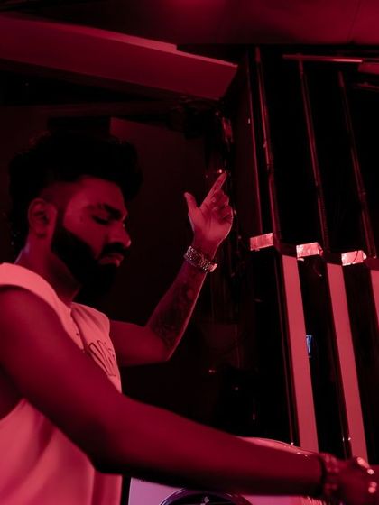 A moody, red-lit shot of me mixing at FLO Church Street.