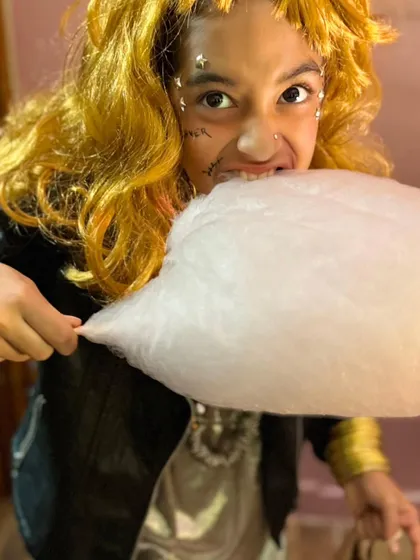 Another shot of our rockstar ghost enjoying her cotton candy.