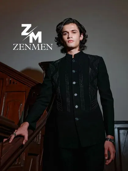 Another shot of the black velvet bandhgala, showing the subtle texture and sharp tailoring from a different angle.