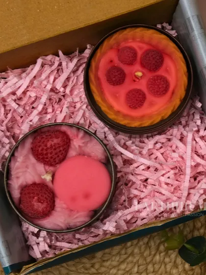 This gift box contains two of my favorite dessert tin candles: a strawberry tart and a strawberry macaron design.