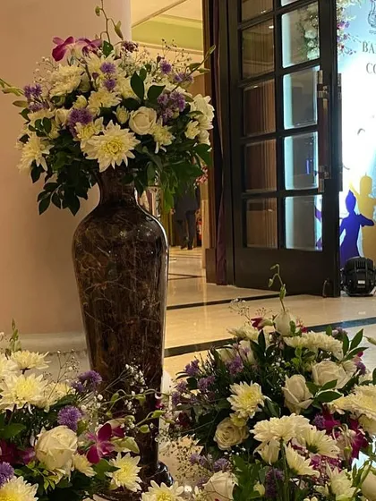 A close-up of the elegant floral decor used at the BMRCL event. Our attention to detail extends to decorative elements that enhance the overall atmosphere of an event.