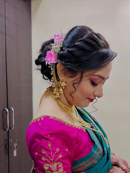 A beautiful profile of the romantic floral updo.