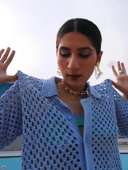 A close-up from a creative shoot I styled for crochet brand Rasti India. The focus is on the texture of the knitwear and playful accessories.