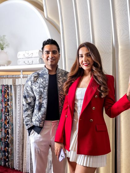 A close-up portrait within the space. The soft, diffused light from the fabric fins created the most beautiful, gentle glow, perfectly complementing the elegance of the materials on display.