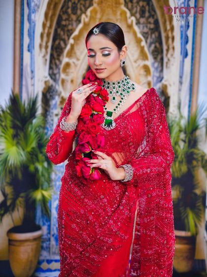 A full-length view of the bride, demonstrating how our students learn to style a complete and cohesive look for their portfolio.