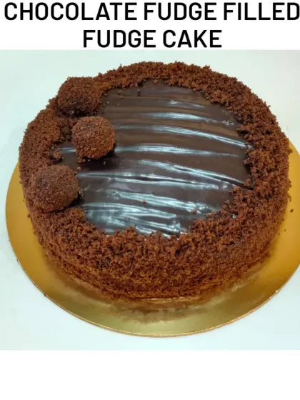 The ultimate indulgence: a Chocolate Fudge Filled Fudge Cake. This is a rich, dense chocolate cake with a gooey fudge center and a coating of chocolate cake crumbs.