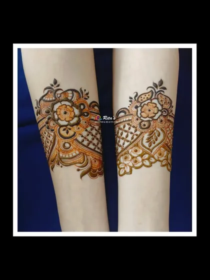 A close-up of the floral arm bands.
