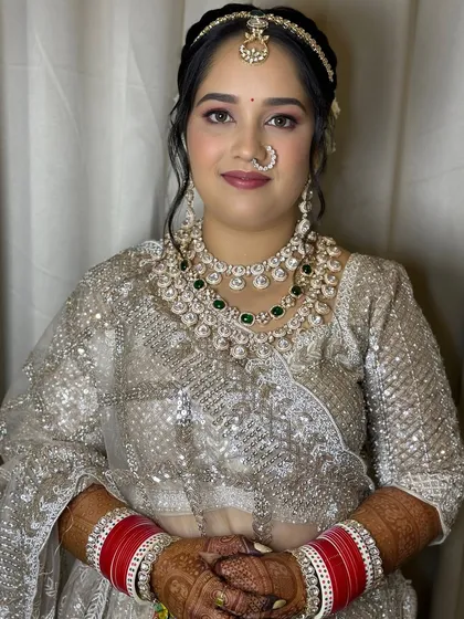 A soft and elegant night phera look for my bride from UP, Sneha, in a beautiful silver lehenga.