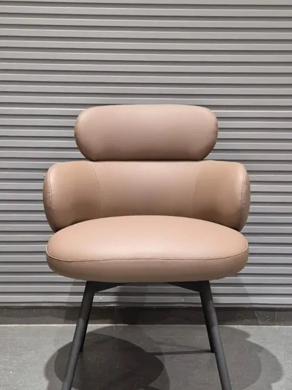 A frontal view of the tiered-back chair.