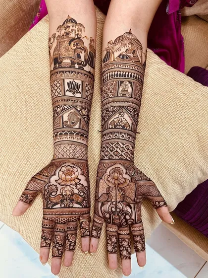 A blend of auspicious symbols for a traditional bride. This full-hand mehendi design features prominent lotus flowers for purity, elephants in a procession for good luck, and intricate geometric patterns for a rich, dense look.