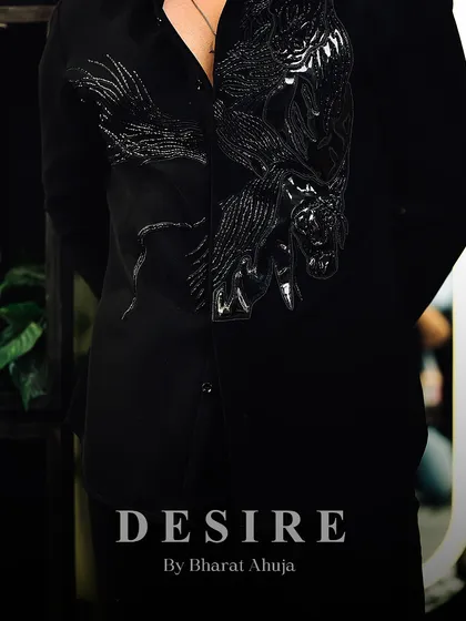 Another view of the black-on-black embroidered shirt, a piece that is perfect for any occasion where you want to make a sophisticated statement.