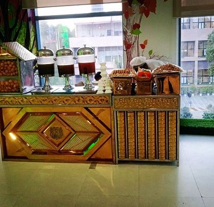 Our elegant gold-themed live chaat counter, perfect for corporate events and weddings, adding a touch of luxury to street food favorites.