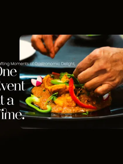 Crafting moments of gastronomic delight, one event at a time. A chef's hands carefully plate a dish, symbolizing the personal touch and artistry we bring to our work.