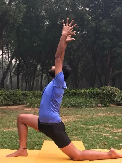 Anjaneyasana (Low Lunge) provides a deep stretch for the hip flexors and quadriceps. With arms reaching up, it becomes an uplifting pose that opens the chest and encourages a full, deep breath.