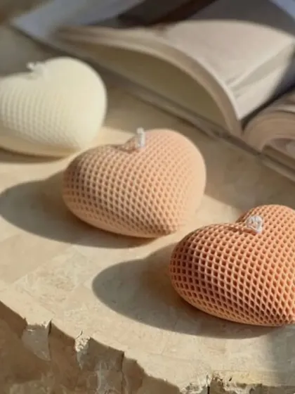 Our mini heart-shaped pillar candles are a new budget-friendly addition to our catalog. They are perfect for Valentine's or as a small token of love.